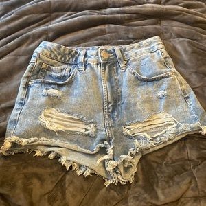 Distressed blue jean shorts